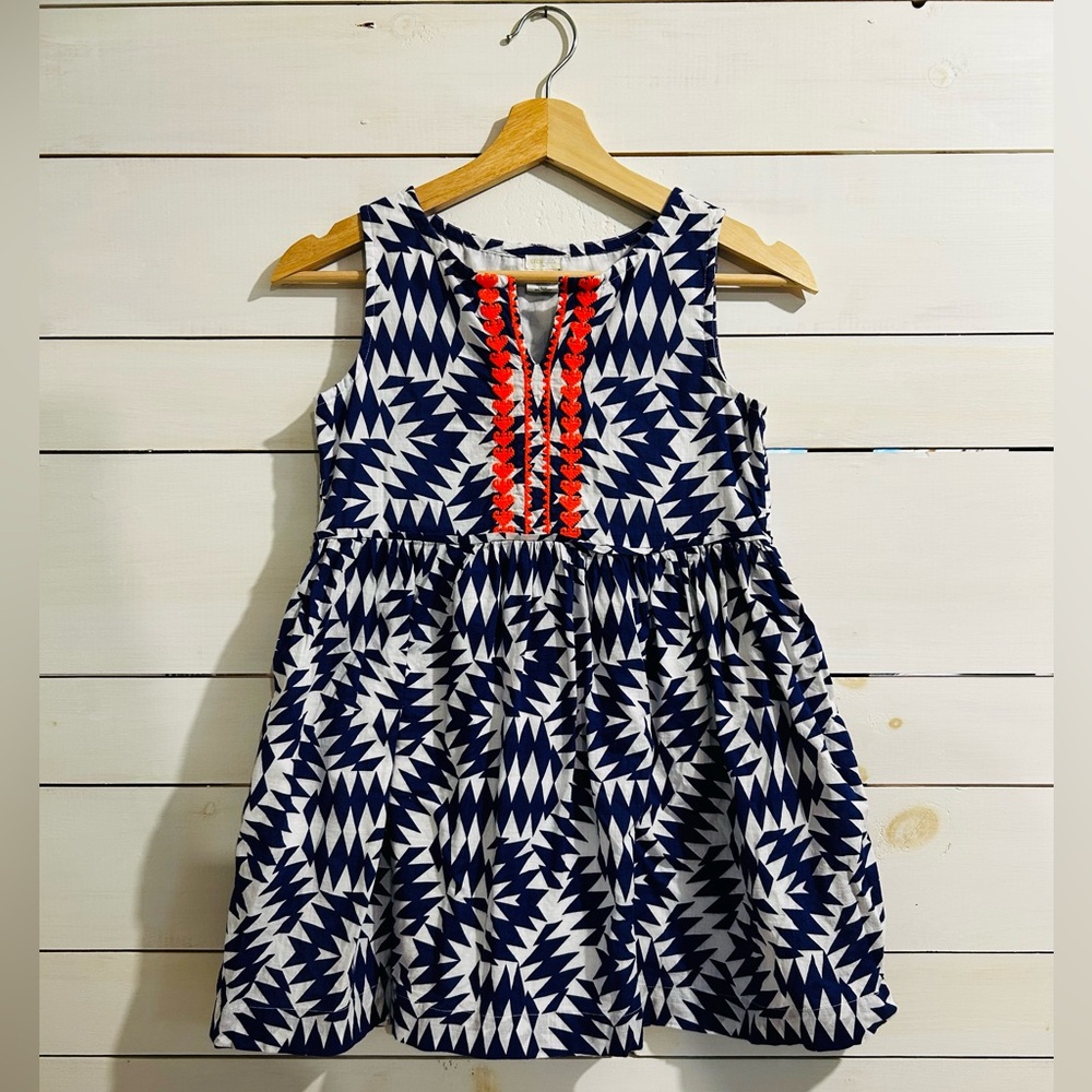 A Crewcuts dress, blue with a bright orange pattern near the neckline